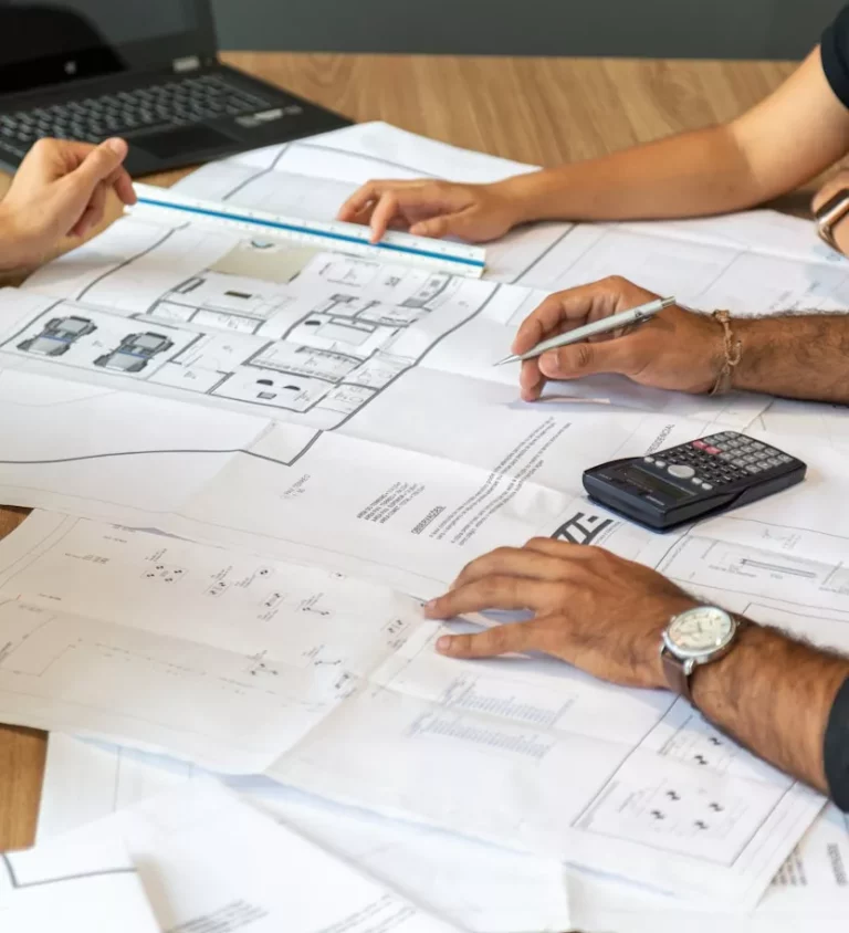 person writing on white paper